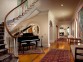 curved staircase piano